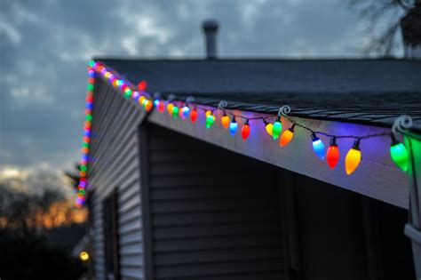 hanging christmas lights on metal house|putting up outside christmas lights.